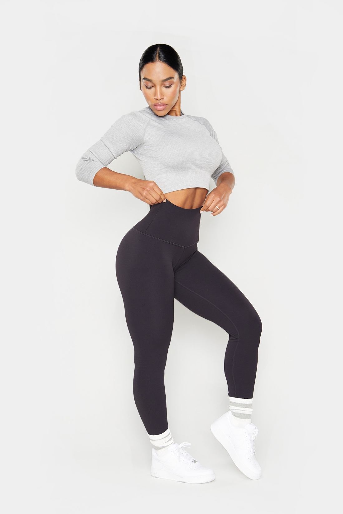 TONALift leggings, hands at the waistband